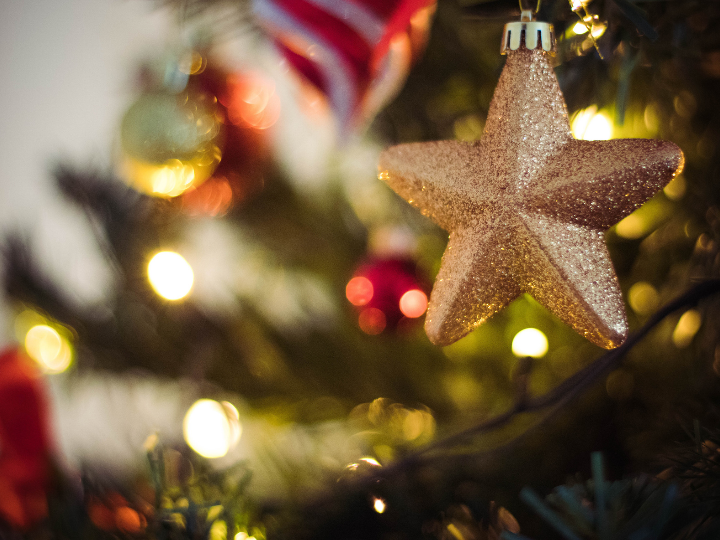 Christmas events in Essex - close up of a gold star hanging on a Christmas tree