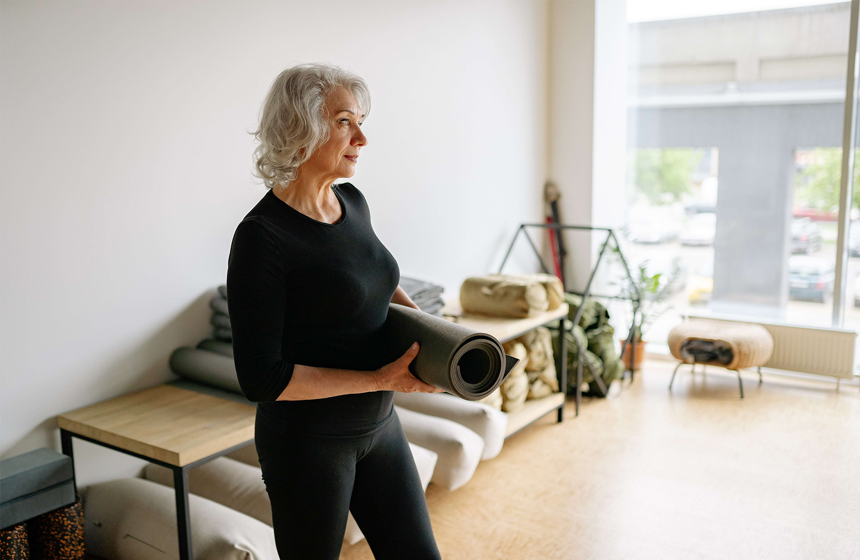 An image of a resident at an exercise class at Burnham Waters luxury retirement community.