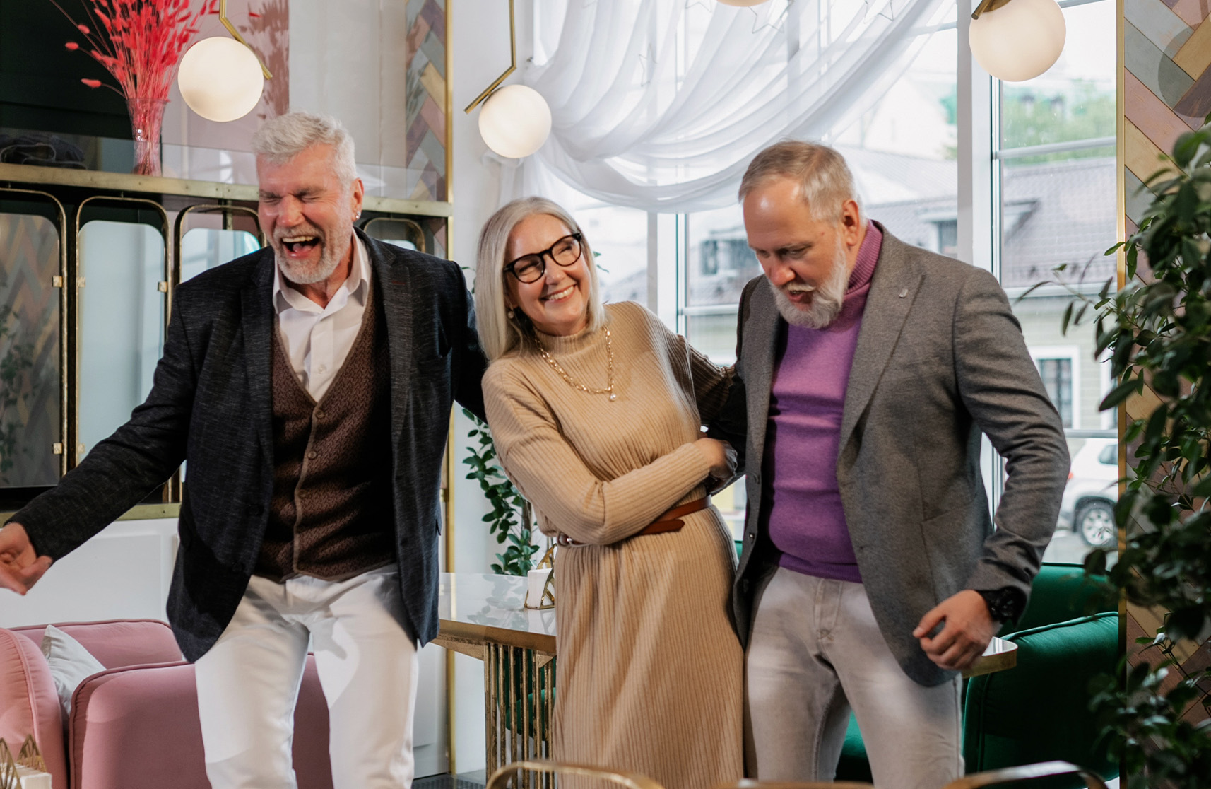 An image of 55 and overs having a party on New Year's Eve to represent 2023 and new resolutions.