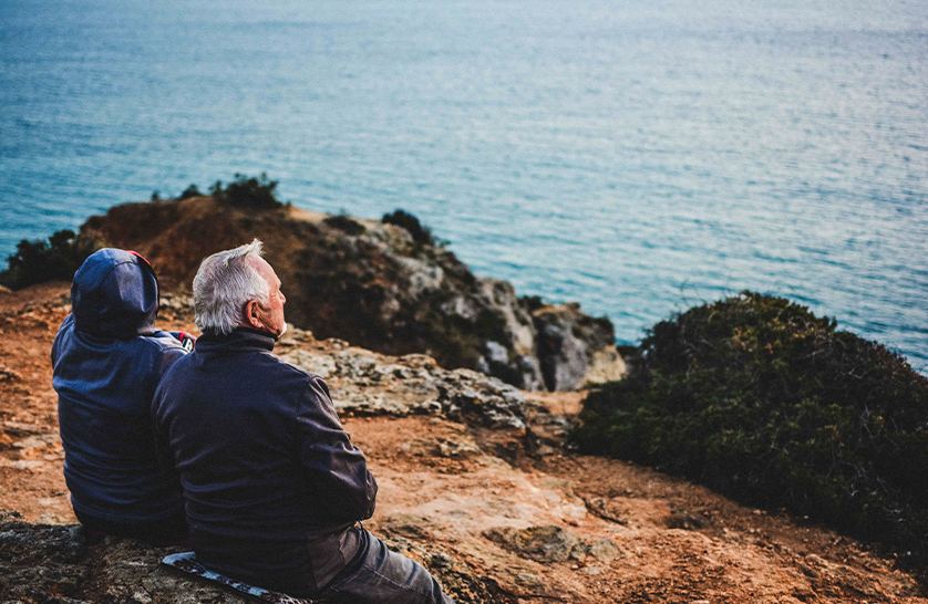 An image of a retired man contemplating how luxury retirement villages can help with purpose in retirement.