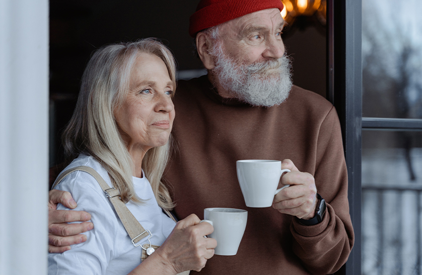 An image of an older couple enjoying a cup of tea in lifestyle retirement villages.