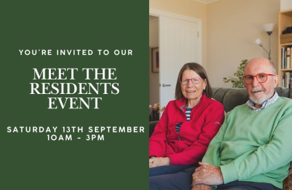 Meet the Residents Event at Burnham Waters: The new retirement village in Essex. Retired couple sat together in the sofa in their bungalow