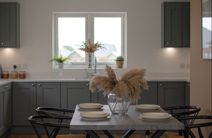 Burnham Waters Sales event - sage green kitchen in new three-bedroom bungalow show home