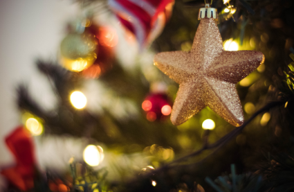 Christmas events in Essex - close up of a gold star hanging on a Christmas tree