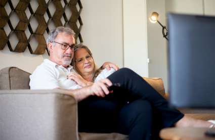 A couple embracing the new home features in our 55 and overs community.