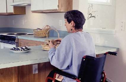 An image of a disabled women benefitting from the facilities retirement villages with bungalows offer.